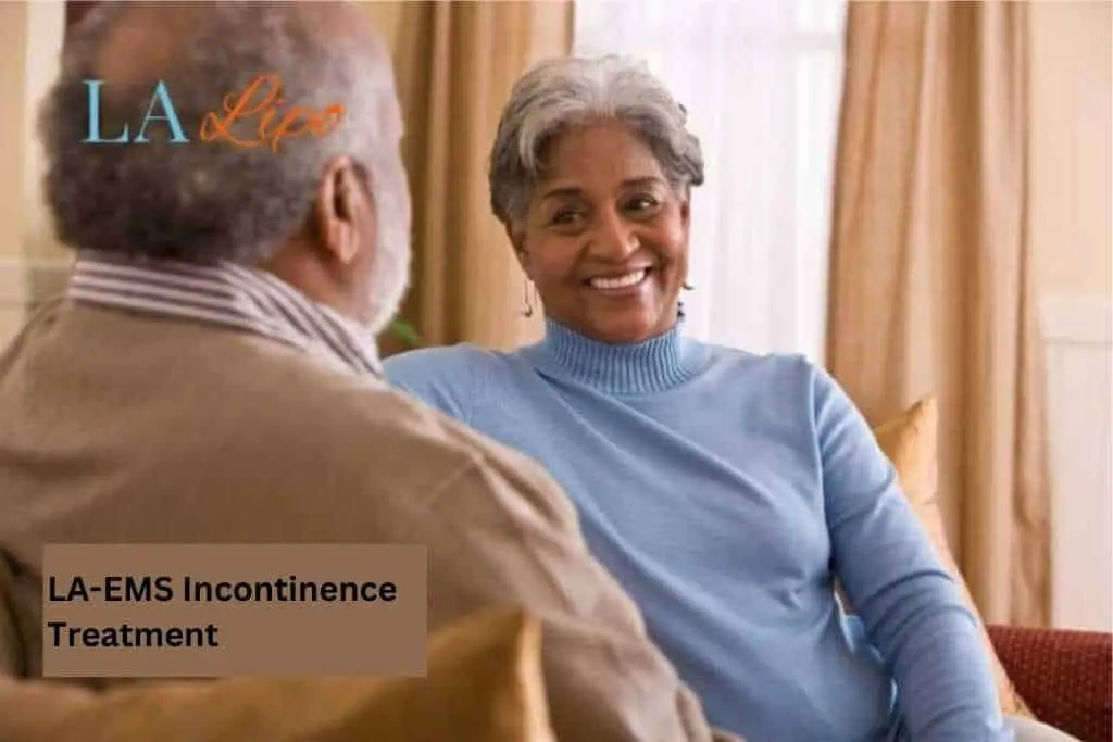 Couple sat smiling at each other - LA-EMS treatment Uxbridge