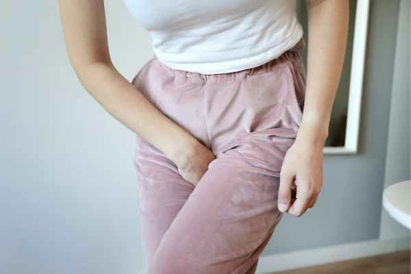 older woman running to the toilet because of urinary incontinence Uxbridge